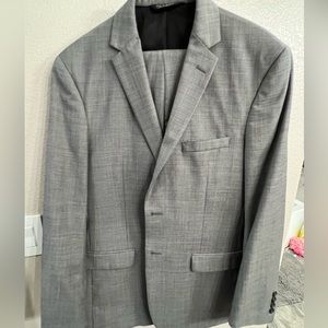 Men’s light grey suit jacket and pants